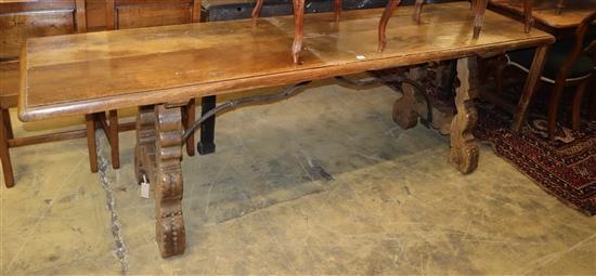 An 18th century Spanish oak centre table, W.240cm, D.60cm, H.74cm